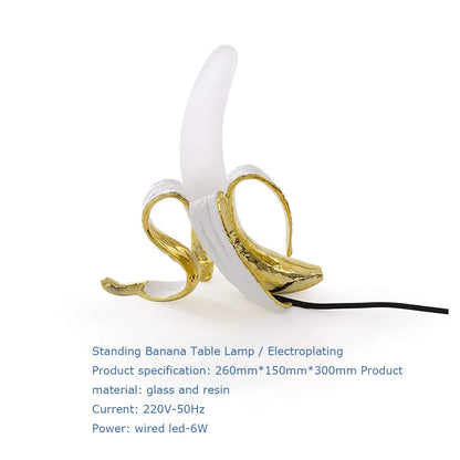 Lampa stołowa Banana Lamp z żółtą obudową ABS i diodą LED.